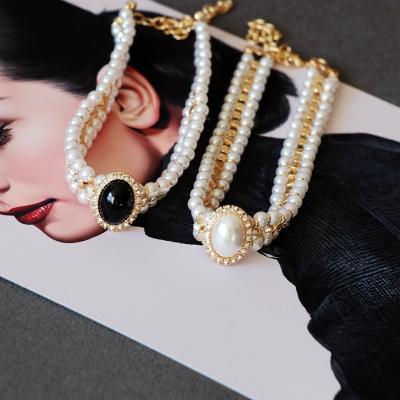 China Western Medieval Black White Imitation Pearl Necklace Fashion Hepburn Necklace Fashion Pearl Needle Silver Earrings Set Cheongsam Dress for sale