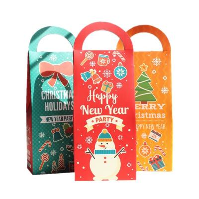 China Merry Christmas Recyclable Handle Candy Chocolate Cookie Wrapping Paper Box For New Year Party Decoration Gift Boxes for sale