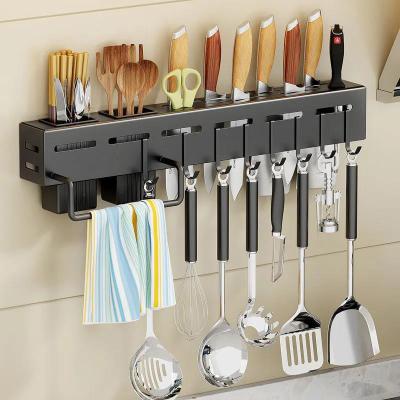 China Sustainable Multifunctional No Drilling Powerful Wall Mounted Kitchen Stainless Steel Knife Rack Holder With Paper Hanging Rod And Hooks for sale