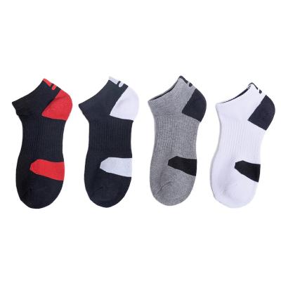 China New QUICK DRY towel bottom men's non-slip sports socks hit color basketball socks for sale