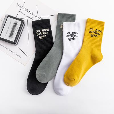 China 2021 high street European American English letters fashion cotton couples sports QUICK DRY soft socks for sale