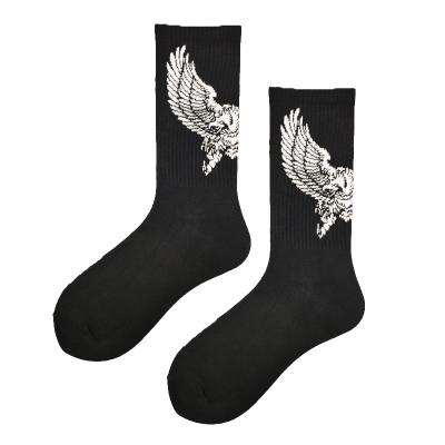 China New QUICK DRY cartoon pattern breathable white black cotton men's new mid tube knitted socks for sale