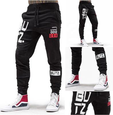 China Breathale 2021 Hot Sale White Digital Printed Jogger Track Pants Men's Casual Sports Tracksuits for sale