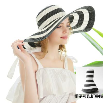 China JAKIJAYI Women Women Straw Striped Hat Derby Beach Sun Striped Natural Lady Summer Wide Brim UV Protect Hats for sale