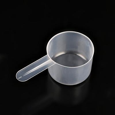 China Sustainable plastic dispenser 50ml milk powder available vending spoon plastic milk powder measuring cup for sale