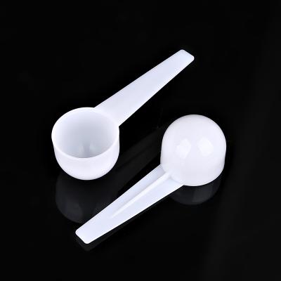 China Viable White Color Doser 9ml Plastic Milk Powder Spoon Plastic Albumen Powder Spoon for sale