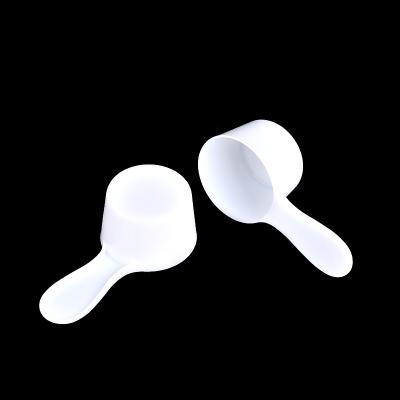 China Disposable white color powder milk spoo pp 40ml plastic spoon for powder for sale