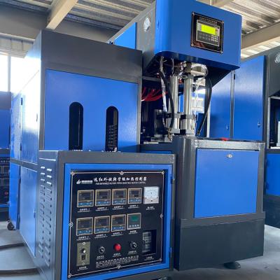 China DELTA PLC Semi Auto Kleine Plastic Pet Drink Water Sap Fles Pot Maker Stretch Blow Blowing Mold Making Machine Te koop