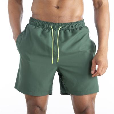 China 2022 QUICK DRY springs and summer new designs plus size mens clothing waterproof sports beach shorts for sale