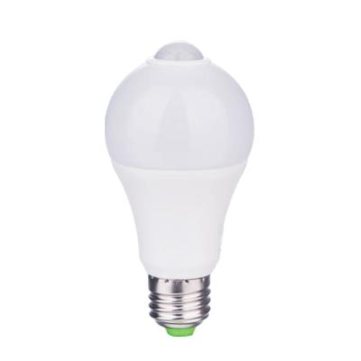 China Warehouse 12W E27 B22 LED A60 PIR Motion Sensor Bulb Light Human Motion Sensor Led Bulb for sale