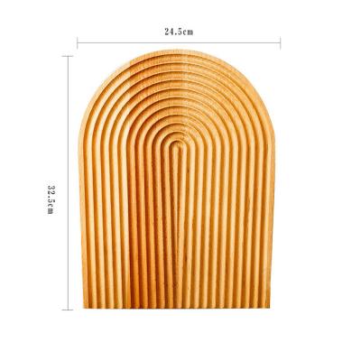 China Japanese Style Sustainable Beech Wood Swirl Cake Cutting Board Non-Slip Chopping Bread Board for sale