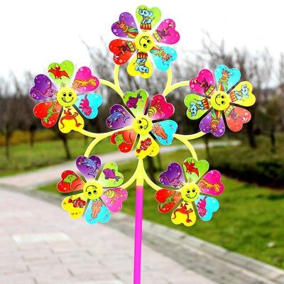 China Outdoor Toy Cartoon smiley six-wheeled windmill wholesale children's outdoor toys campus garden decorations for sale