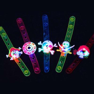 China Light-up Halloween Party Favors for Kids LED Light Up Bracelet Halloween Toys Treats Goody Bag Flashing Candy Gift Bag Fillers for sale