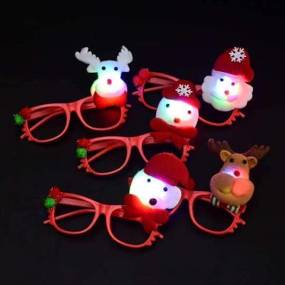 China PP New Year Glow in Dark Party Christmas Day LED Light Up Glasses for Kids Adult Holiday Decorations Gifts for sale