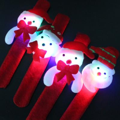 China Fabric High Quality LED Light Up Band Slap Bracelets Wholesale Christmas LED Slap Bands Kids Party Cute Santa Elk Snowman Plush for sale