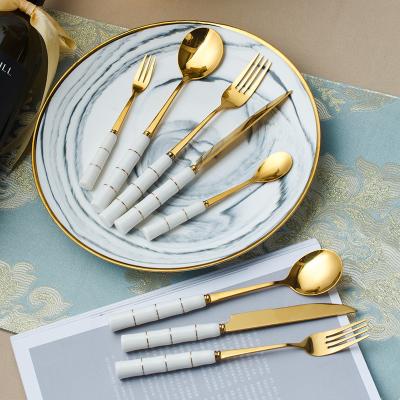 China 2023 Stainless Steel Titanium Handle Knife Fork Spoon Viable Ceramic European Tableware Set Nordic Tableware for sale