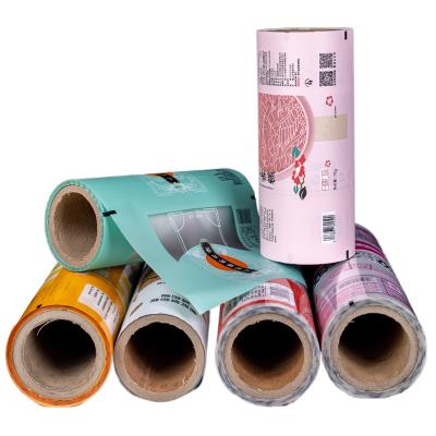 China Custom Printing Plastic Moisture Proof Foil Laminated Flexible Heat Sealable Food Packaging Materials Roll Stock Film For Auto Wrapping for sale