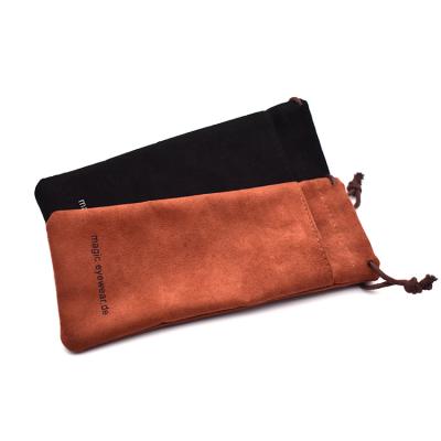 China Custom Design Fabric Suede Maofar Glass Eye Pouch Space Saving Pouch With Drawstring for sale