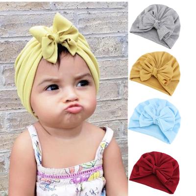 China Soft Baby Image Cotton Bowknot Beanies Solid Cute Turban Hats For Newborn Baby Boy Girls Headwraps for sale