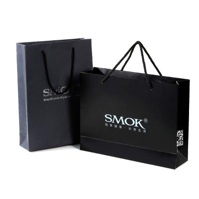 China Shenzhen Recyclable Pink Gift White Paper Clothing Material Eco - Friendly Bag Packaging for sale