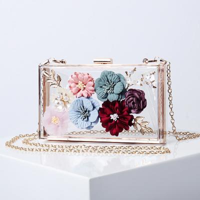 China Hot Selling Small Clear Transparent Evening Flower Decoration Daily Use Bag Cosmetic Acrylic Handbag for sale