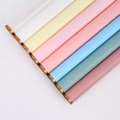 China Waterproof PVC Paper Gold Edge Flower Bouquet Waterproof Hot Selling Cheap Wrapping Paper for sale