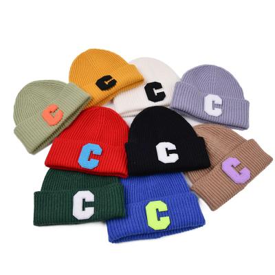 China 2021 NEW COMMON Trend Candy Letters C Cute Colorful Warm Knitted Beanie Hat For Women Men for sale