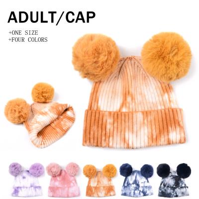 China 2021 New Arrival Fashion JOINT Tie Dye Knitted Ladies Winter Outdoor Warm Cute Hat With Top Fur Balls for sale