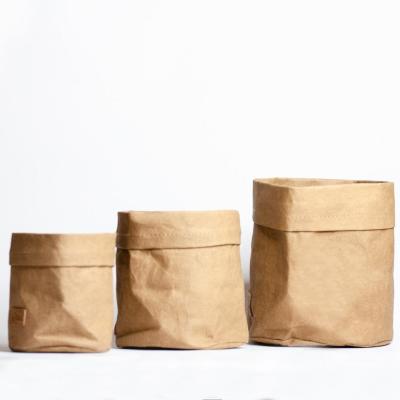 China Corrosion Resistance Kraft Paper Garden Flower Planter Desktop Pot Material Washable Paper Flower Bags for sale