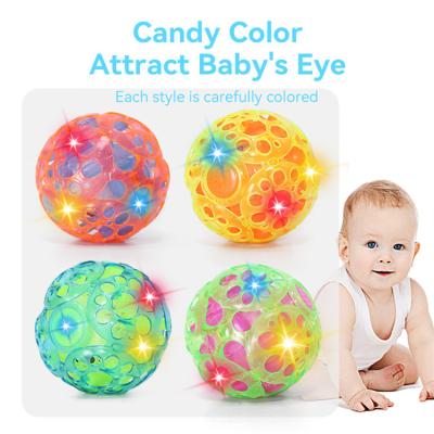 China Sports toys flashing jumping ball with light and music pop music luminous jumping ball electric children's toys for sale