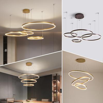 China Modern Simple Decorative Ceiling Hanging Pendant Lights Surround Rings Acrylic Gold Luxury Modern Led Chandelier for sale