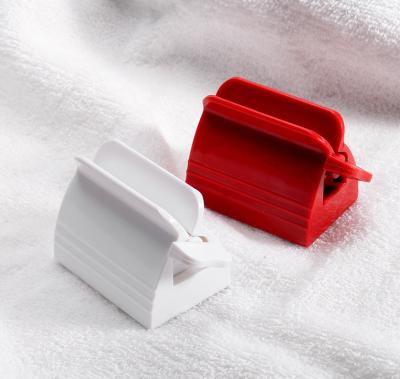 China Creative Manual Lazy Toothpaste Clip Kids Bathroom Accessories Viable Toothpaste Squeezer Lazy Dispenser for sale