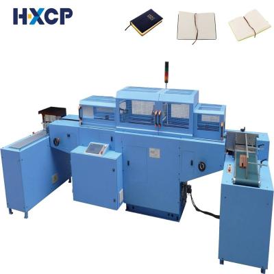 China machinery & Automatic high-speed professional hardware ribbon inserting machine kids school notebook account book silk inserts installation for sale