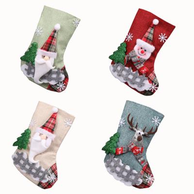 China 25g Christmas Candy Gift Bag Decoration Props Santa Snowman Socks Medium Gift Christmas Socks Decoration for sale