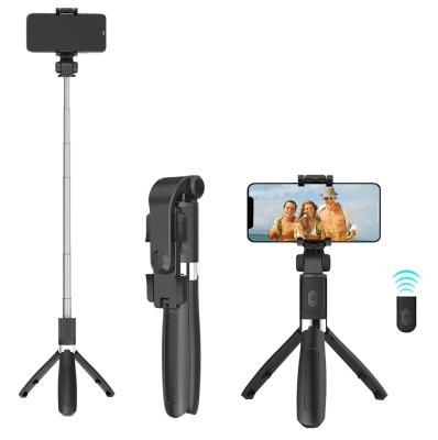 China New Arrival Flexible Folding Mini 360 Degree Rotation Shutter Tripod Remote Selfie Stick Live Tripod For Smart Phone for sale