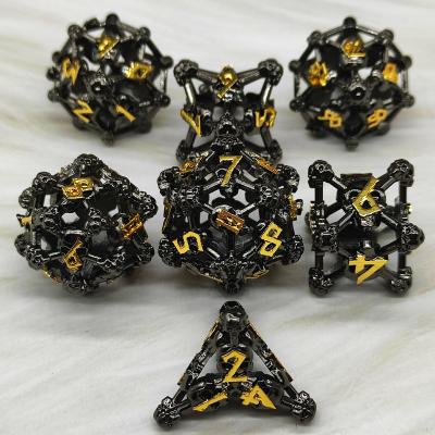 China Custom D&D Dragon Dice Tray Role Playing Games Sharp Gold D20 Resin Skull Dice Skull Black Polyhedral DND Metal Brass Hollow Dies Set LK for sale