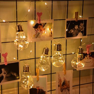 China Wedding Holiday Decoration Copper Wire Lamp String 5*7 Light Bulb Holiday Decoration Small Retro Edison Round Solar Ball Lamp String for sale