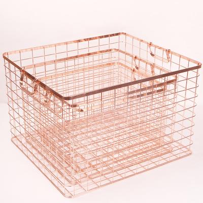 China Household Decoration OEM Metal Viable Wire Rose Gold Storage Basket Clothes Tidying Basket for sale