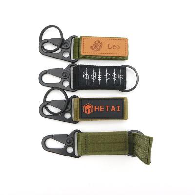 China Promotioanal Gifts / Give Away Custom Logo Zinc Alloy Outdoor Khaki Black Army Green Hook & Loop Gear Cuts Heavy Duty Tactical Keyholder Key Chain for sale