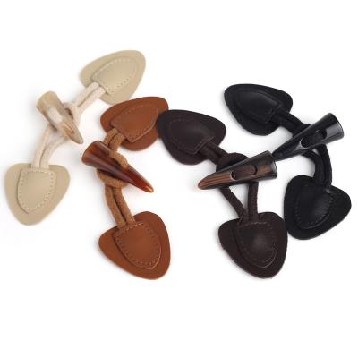 China Viable Professional Classic Leather Coat Toggle Button Design Horn Accessories Stitching Buttons for sale