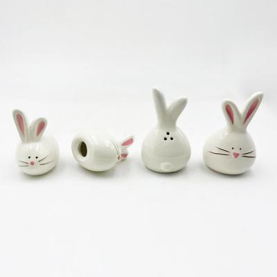 China Stylish Porcelain Rabbits Ceramic Bunny Figurines Easter Decoration Gift For Various Purpose for sale