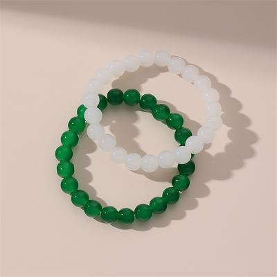 China Factory Supply Durable Green Natural Elastic Healing Stone Crystal Balls Beaded Bracelet White Beaded Bracelet for sale