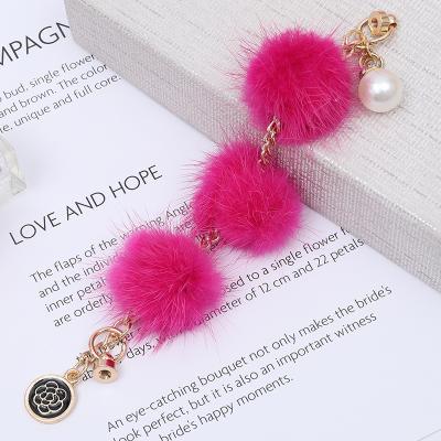 China Hot Selling Popular Popular Fur Ball Pom Poms Screw Buckle Mobile Phone Accessories for sale