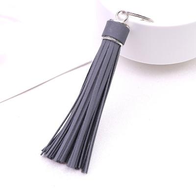 China Factory Popular Main Product PU Tassel Fashion Personality Luminous Reflective Leather Key Chain Key Chain for sale