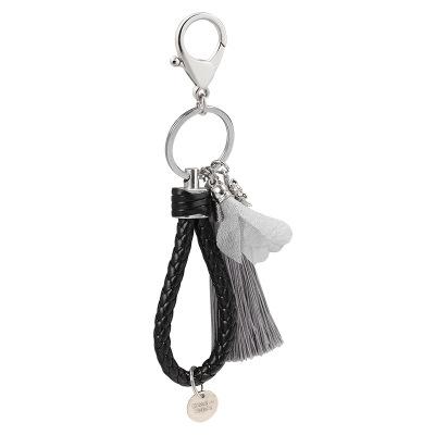 China Popular Leather Flower Tassel Small Key Chain Fashion Girl Car Key Chain Pendant for sale