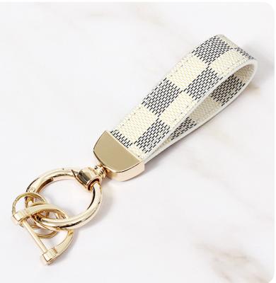 China Creative New Popular PU Square Key Chain Leather Rope for Men and Women PU Leather Car Key Chain for sale