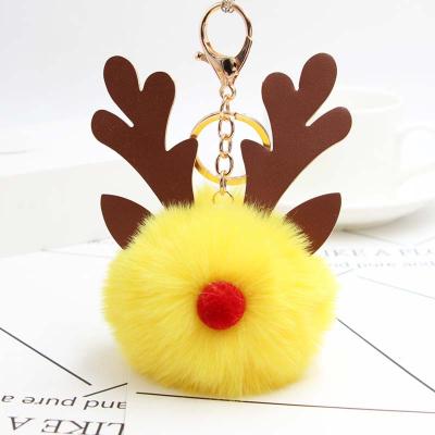 China Hot Selling Popular Pom Pom Ball Keychain Christmas Reindeer Fur Ball Key Holder PU Deer Key Chain for sale