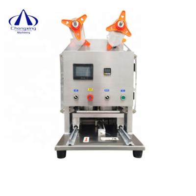 China Automatic Food Sealing Machine Filled Tray Sealer Sealing Machinery For Frozen Food Packaging for sale