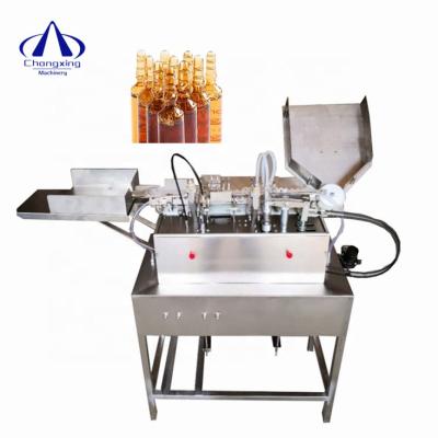 China Work Efficiently Automatic Closed Pharmaceutical Bottle Filling and Glass Ampoule Sealing Machine for sale