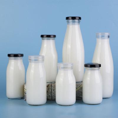 China Eco-friendly Printing 200ml 250ml 500ml Recyclable Wholesale Custom Glass Milk Bottle Water Cup Bottle Juice Beverage Bottles With Metal Lid for sale